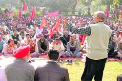 Members of the Centre of Indian Trade Unions stage a protest in support of their demands in Ludhiana on Sunday. 
