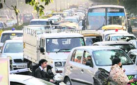Vehicles stuck in a traffic jam on Madhya Marg, Chandigarh, on Monday.@