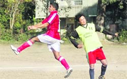 A match in the Late Manvender Singh Memorial Football Tournament in Dehradun on Monday.