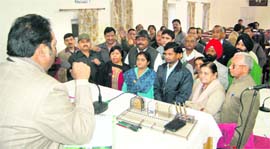 Agitated BJP councillors protest before the Mayor during a board meeting in Dehradun on Monday.