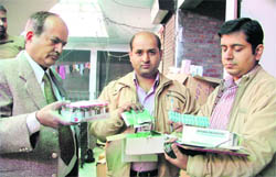 Health officials show the habit-forming drugs seized from a godown at Pindi street in Ludhiana