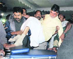 Naidu being taken to a hospital in Hyderabad.