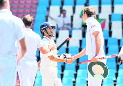 South African players shake hands with Sachin Tendulkar after the first Test in Centurion