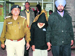 The kingpin of a robbers gang, Bablu, in police custody in Chandigarh