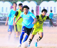 A match in the Shivalik Trophy Football Tournament being played at the Survey of india grounds in Dehradun on Tuesday