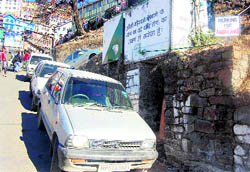 Private vehicles occupy the space reserved for ambulances at Shimlas Deen Dayal Upadhaya Hospital