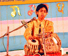 Mohandeep Bawara plays tabla at the Shree Baba Harivallabh Sangeet Pratiyogita in Jalandhar on Tuesday