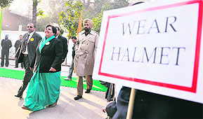KVM principal Navita Puri escorts Addl. DCP SS Cheema (extreme right) at the launch of Sahyog in Ludhiana on Tuesday. 