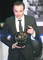 Manchester Uniteds striker Dimitar Berbatov speaks after being voted Bulgarian football player of 2010 for a record seventh time in Sofia on Monday.