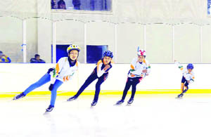 Ladakhi girl ice-skaters perform at the Open Ice-Skating Championship in Dehradun on Thursday.