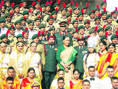 Governor Margaret Alva with the NCC contingent that will take part in the Republic Day Parade in New Delhi, in Dehradun on Wednesday.