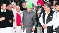 INLD chief Om Prakash Chautala and his party MLAs outside the Haryana Raj Bhawan in Chandigarh 