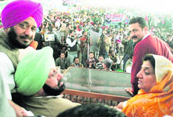President of the PPCC Amarinder Singh and Rajinder Kaur Bhattal at a rally in Sangrur on Wednesday