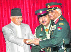Indian Army chief Gen VK Singh is honoured by Nepal President Ram Baran Yadav in Kathmandu on Wednesday.
