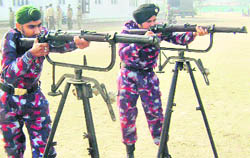 NCC cadets practise shooting during a 10-day camp, organised by 11 Battalion of the NCC, at Harkrishan International School in Amrisar. 