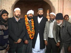 The members of the Muslim community honouring Satpal Kamra at a function organised to mark the reopening of mosque in Fazilka. 