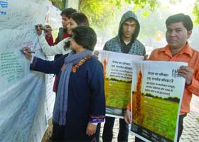 Activists take part in a campaign on the 'Right to Food is a Human Right' under the banner of FIAN in New Delhi