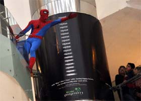 A spiderman performs stunts as kids watch spellbound at a mall in Gurgaon