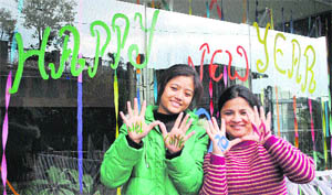 Students of the NIIT centre celebrate the New Year at Dharamsala on Friday.
