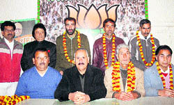 Shamsher Singh Manhas (second from left in the front row) with the leaders of the Janata Dal (Secular) who joined the BJP in Jammu on Friday