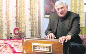 Prakash Sharma plays a harmonium in Jammu