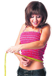 Sit-ups or crunches alone won't tone up a belly. You need to combine them with an overall weight-loss programme
