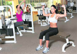 Weights may be a little intimidating but muscular strength is important for women, too.