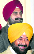 Ravinder Pal Singh Pali who won the Mayors post in a gleeful mood, while Jagjit Singh Kang wears a sad look after losing the election