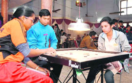A match in the 39th Junior National and Inter-State Carrom Championship under way at Dehradun on Saturday.