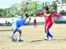 A match in the Great Vivekanand Memorial Football Tournament being played in Dehradun on Saturday.