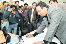 Mayor Vinod Chamoli launches the website of the Dehradun Municipal Corporation on Saturday.