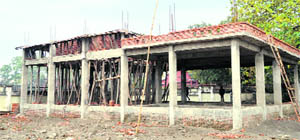 A new building of a postmortem house under construction at the Coronation Hospital in Dehradun.