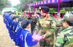 Major Gen TPS Waraich, GOC, Tiger Division, interacts with children belonging to militancy affected areas, in Jammu