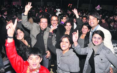 Revellers dance toherald the New Yearat Lodhi Club