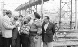 Senior Deputy Mayor Parveen Bansal (left) along with other officials inspects the work at Lakkar Bridge in Ludhiana. 