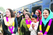 Pilgrims alight from the special Sikh pilgrimage train at Bathinda railway station on Saturday. 