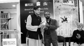 Shashi Tharoor (L) releasing poet-writer-journalist C.P Surendrans Lost And Found