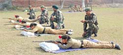 Cadets get tips in rifle shooting during the NCC camp at Abohar. 
