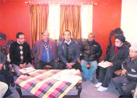 Traders and members of the Hotel Association at a press conference in Mussoorie