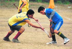 Players at a match of the District Hockey League Championship in Dehradun