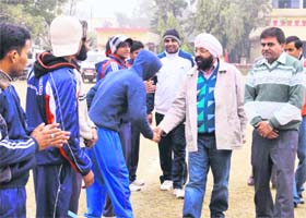 Harbeer Singh, SDM, meets softball players in Haridwar