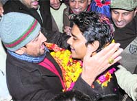Punjabi singer Gurdas Mann welcoming Kamal Khan in Patiala on Sunday.