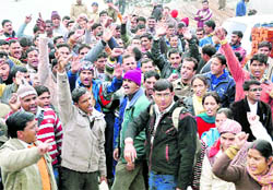 Unemployed teachers hold a demonstration in Dehradun on Monday