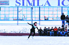 An ice skater performs in the figure-skating event during a national championship