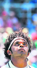 S Sreesanth, who took 5-114, looks up on the second day of the third Test against South Africa in Cape Town on Monday.