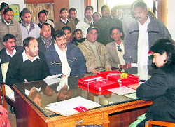 Kalka MLA Pardeep Chaudhary discusses the matter with Deputy Commissioner Ashima Brar in Panchkula