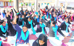 Students participate in a question-answer session at a road safety workshop in Dehradun