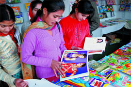College girls throng a stall selling books on make-up, beauty tips and cookery, at the Bathinda Book Fair being organised at the Government Rajindra College on Wednesday.