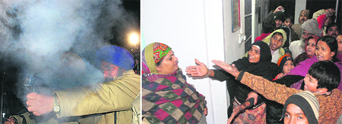 IN ACTION: Tear gas being fired at the mob.