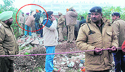 The police cordones off the spot (encircled) where Khushpreets body was found at Phase X in Mohali on Wednesday.